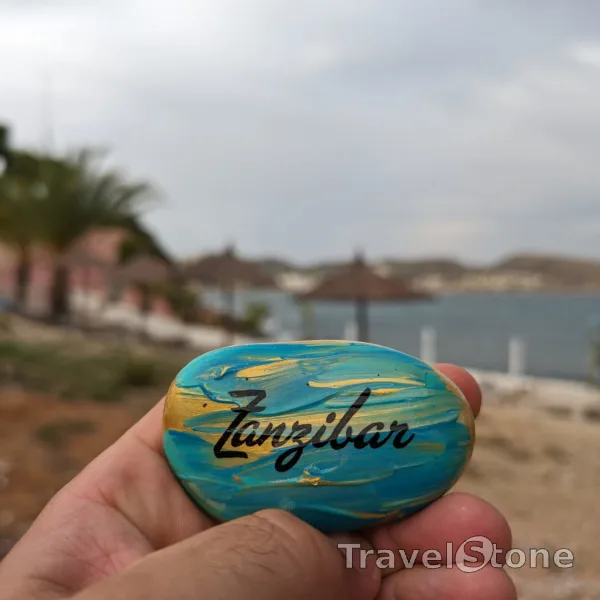 Painted painting stone by artist CJ showing sayings. Zanzibar, Moraira