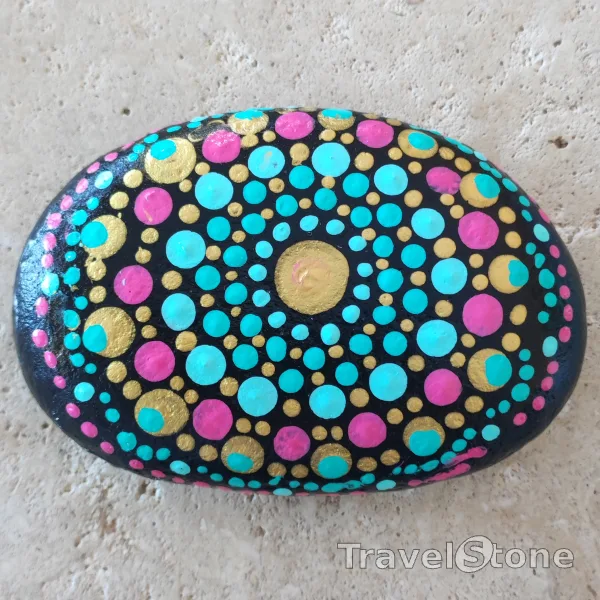 Painted dotting stone by artist LaLiLu showing pattern. Mandala