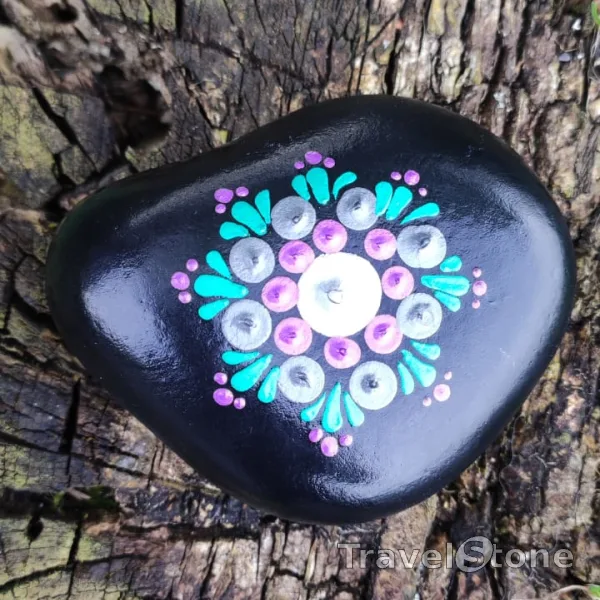 Painted dotting stone by artist CJ showing pattern. Schöne Reise