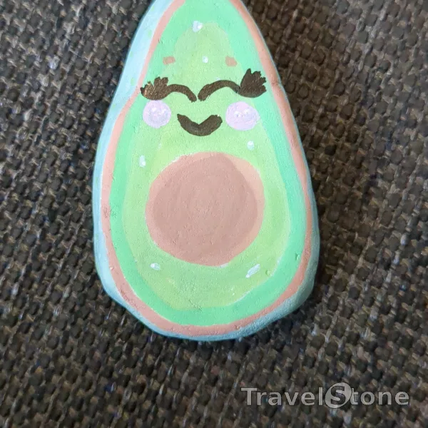 Painted painting stone by artist juanio-zaubermaus showing food. Avocado