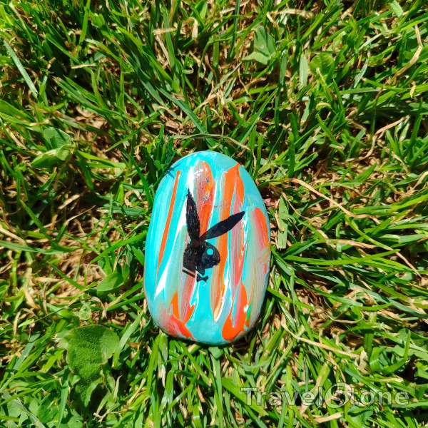 Painted painting stone by artist LaLiLu showing animals. Playboy TravelStone
