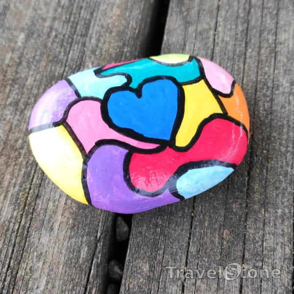 Painted painting stone by artist LaLiLu showing pattern. Farbiges Herz