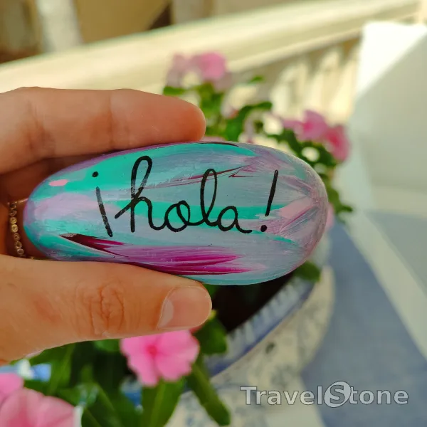 Painted painting stone by artist CJ showing sayings. Hola