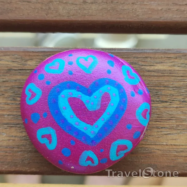 Painted painting stone by artist CJ showing pattern. Lila Herz