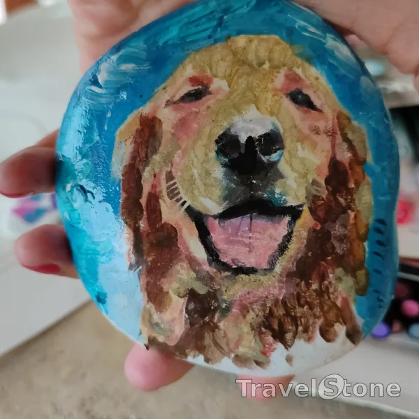 Painted painting stone by artist CJ showing animals. Painted dog stone