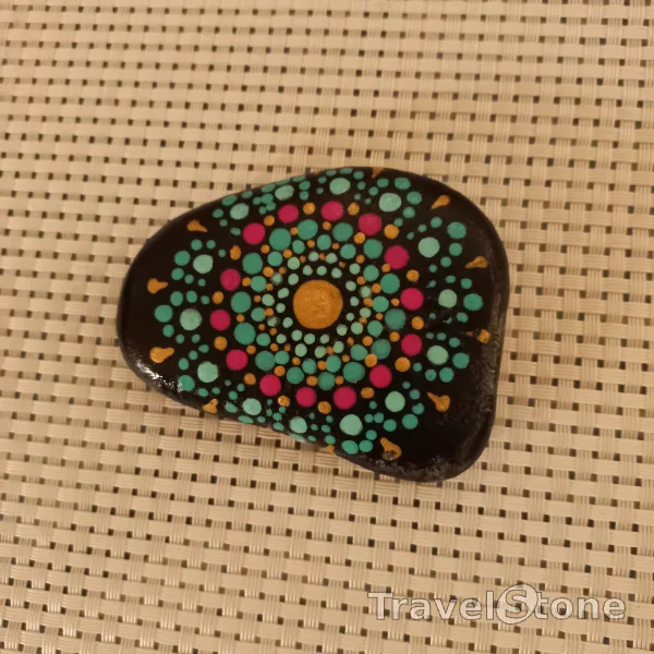 Painted dotting stone by artist Yumi showing pattern. Mandalastein