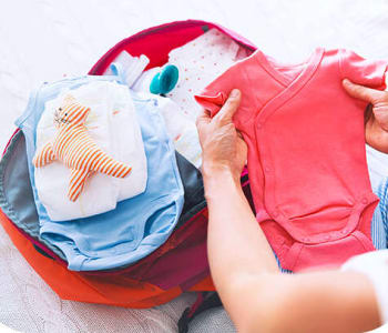 Soyez bien préparée grâce à notre check-list pour votre valise de maternité