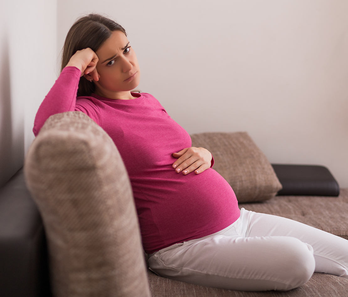 femme enceinte triste