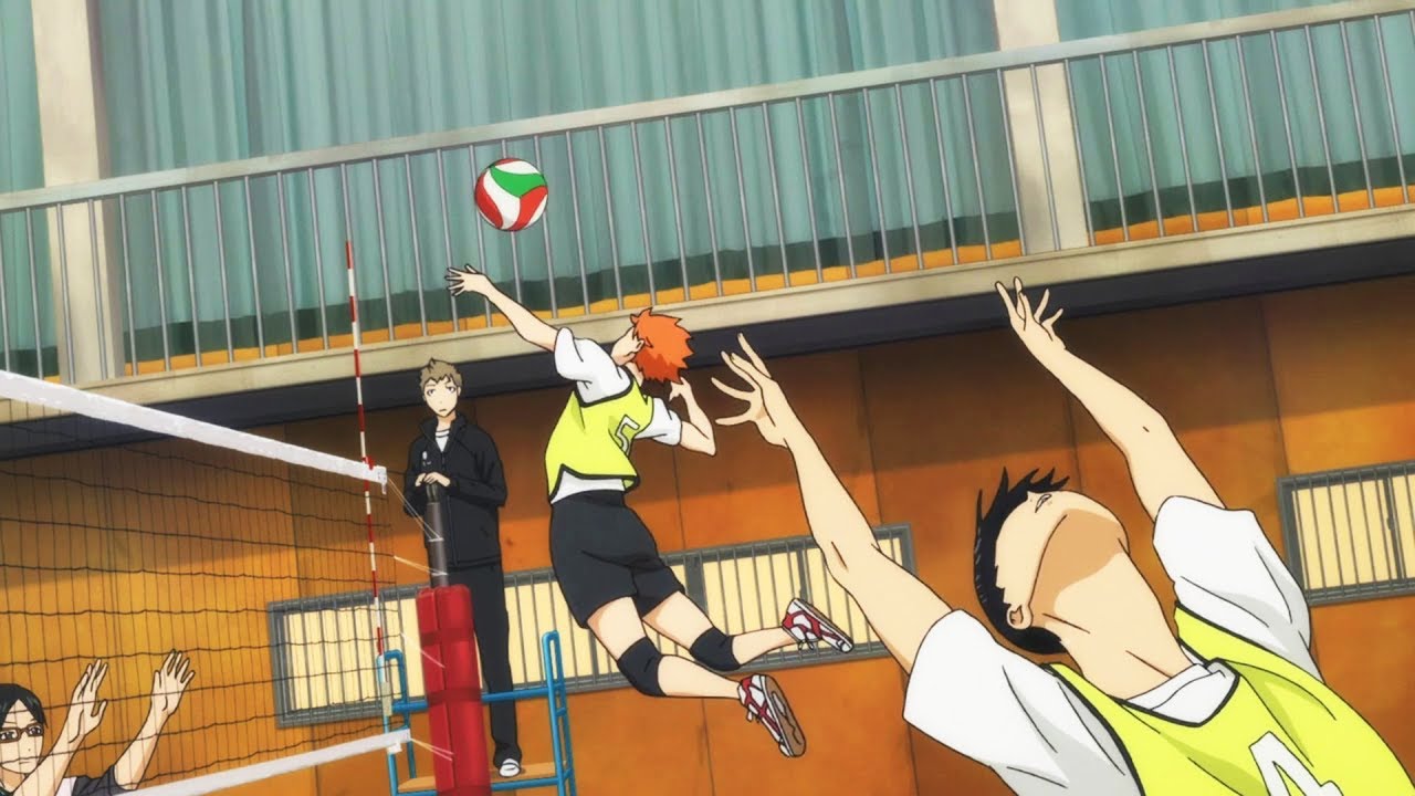 Volleyball match high jump spike