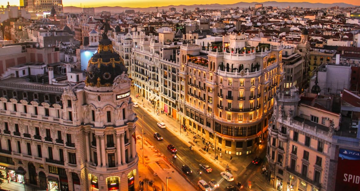 An aerial view of the Metropolis building and Gran Via in Madrid at low sun