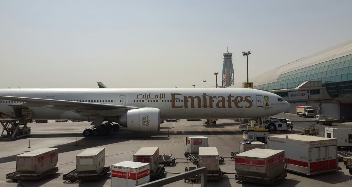 A large jetliner sitting on top of an airport tarmac