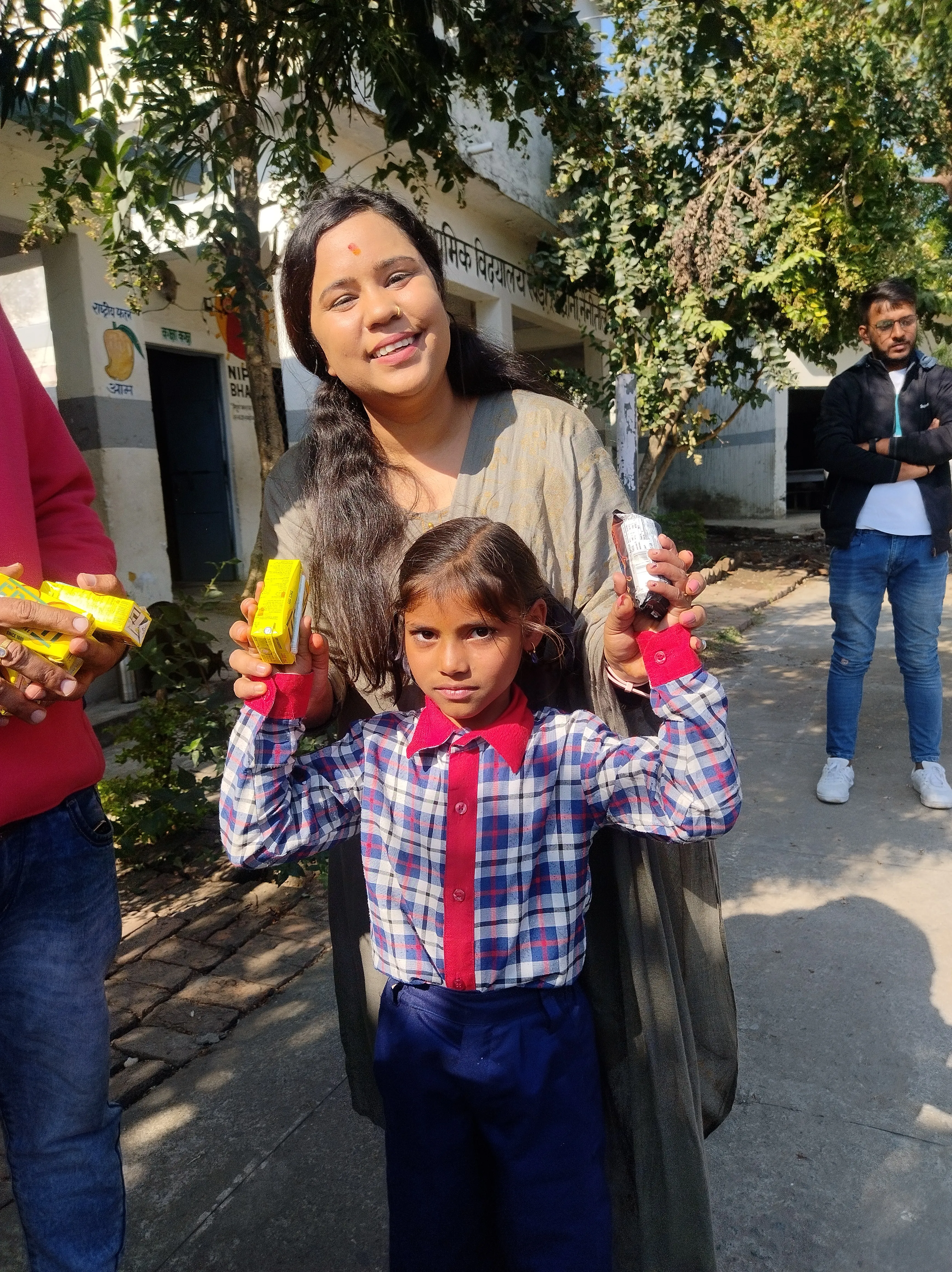 Teacher distributing gifts