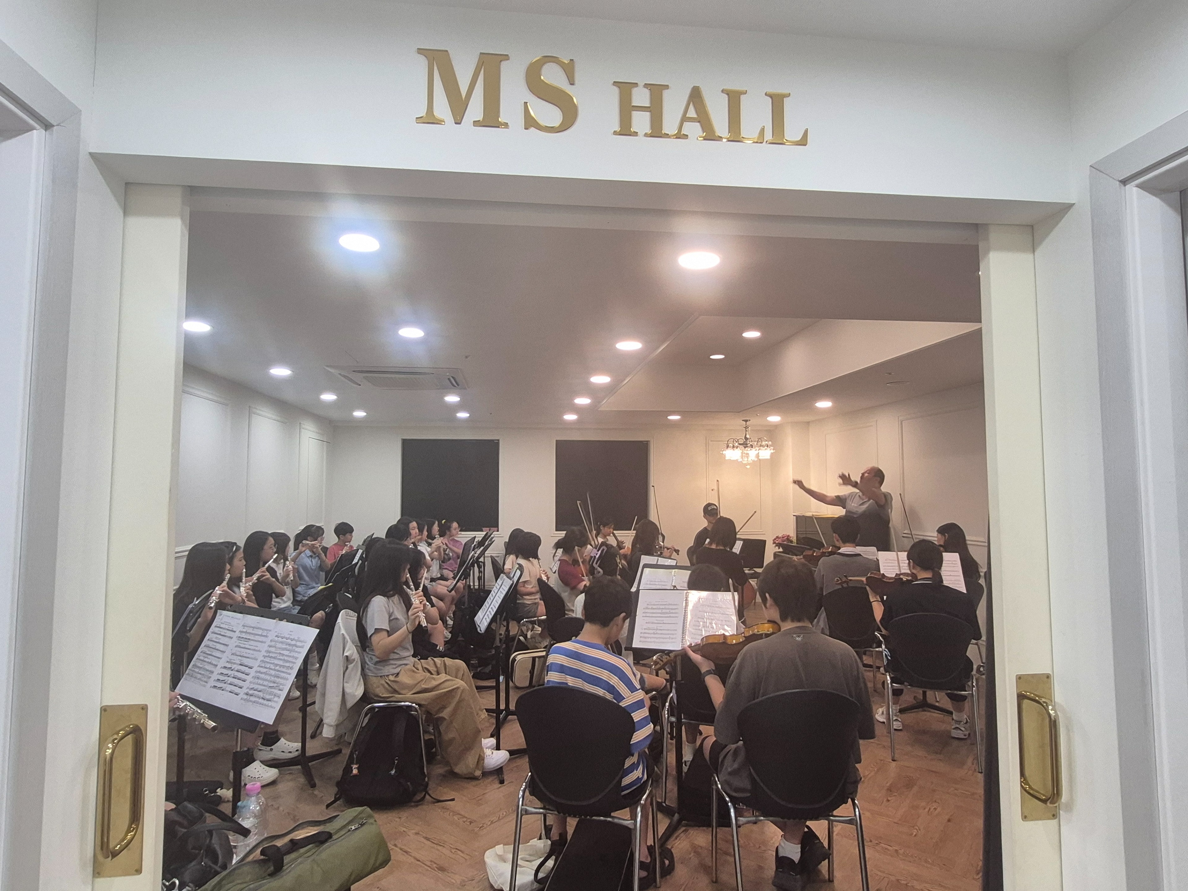 The rehearsal at MS Hall in Ilsan on 15 August, with violins, cellos and flutes.
