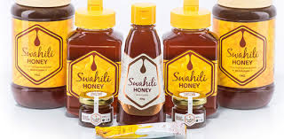 Swahili Honey beekeepers and honey jars in Tanzania