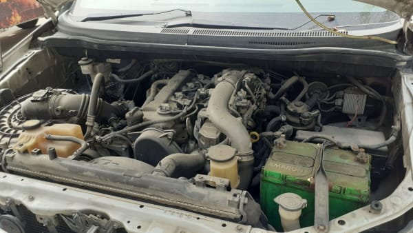 Car engine inspection before scrap pickup by CarBasket - old vehicle evaluation, car dismantling and recycling process