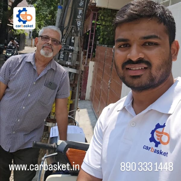 Doorstep Kinetic scooter pickup for scrap in Bangalore by CarBasket - eco friendly vehicle recycling and authorized scrap dealer