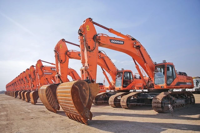 CarBasket team evaluating a scrap JCB at a construction site