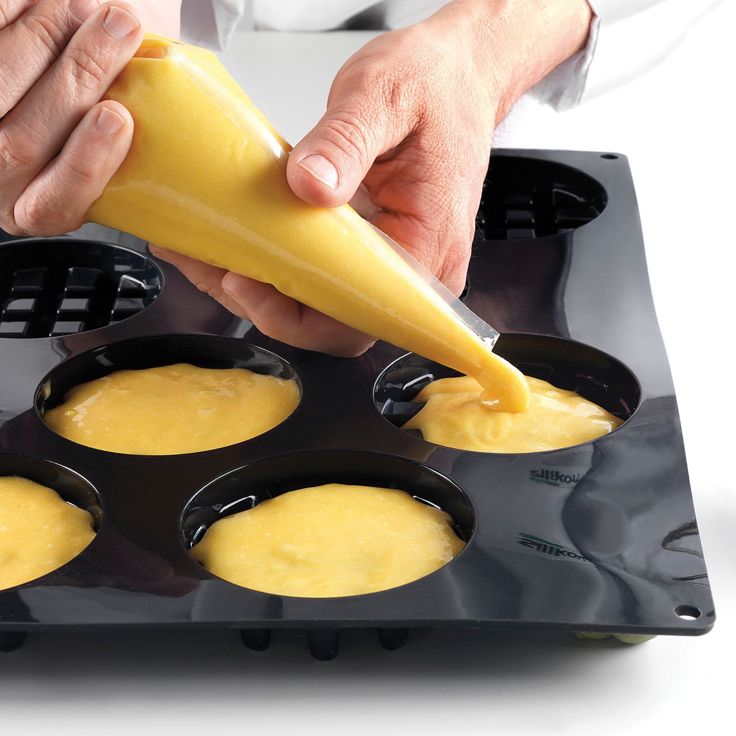 Silikomart SQ007 70 Compartment Mini Muffins Silicone Baking Mold - 1 7/8  x 1 7/8 x 1 1/4 Cavities