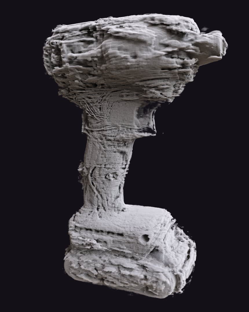 3D surface of the cordless drill reconstructed without geometry correction, rough and broken up