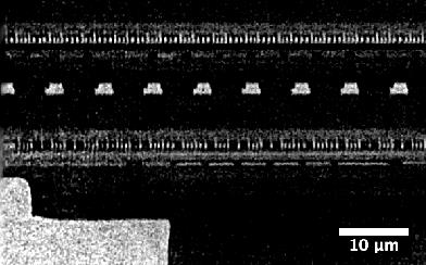 Vertical QRT slice through bonding pads showing density variations