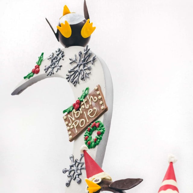 Penguin Snowball Fight sculpture