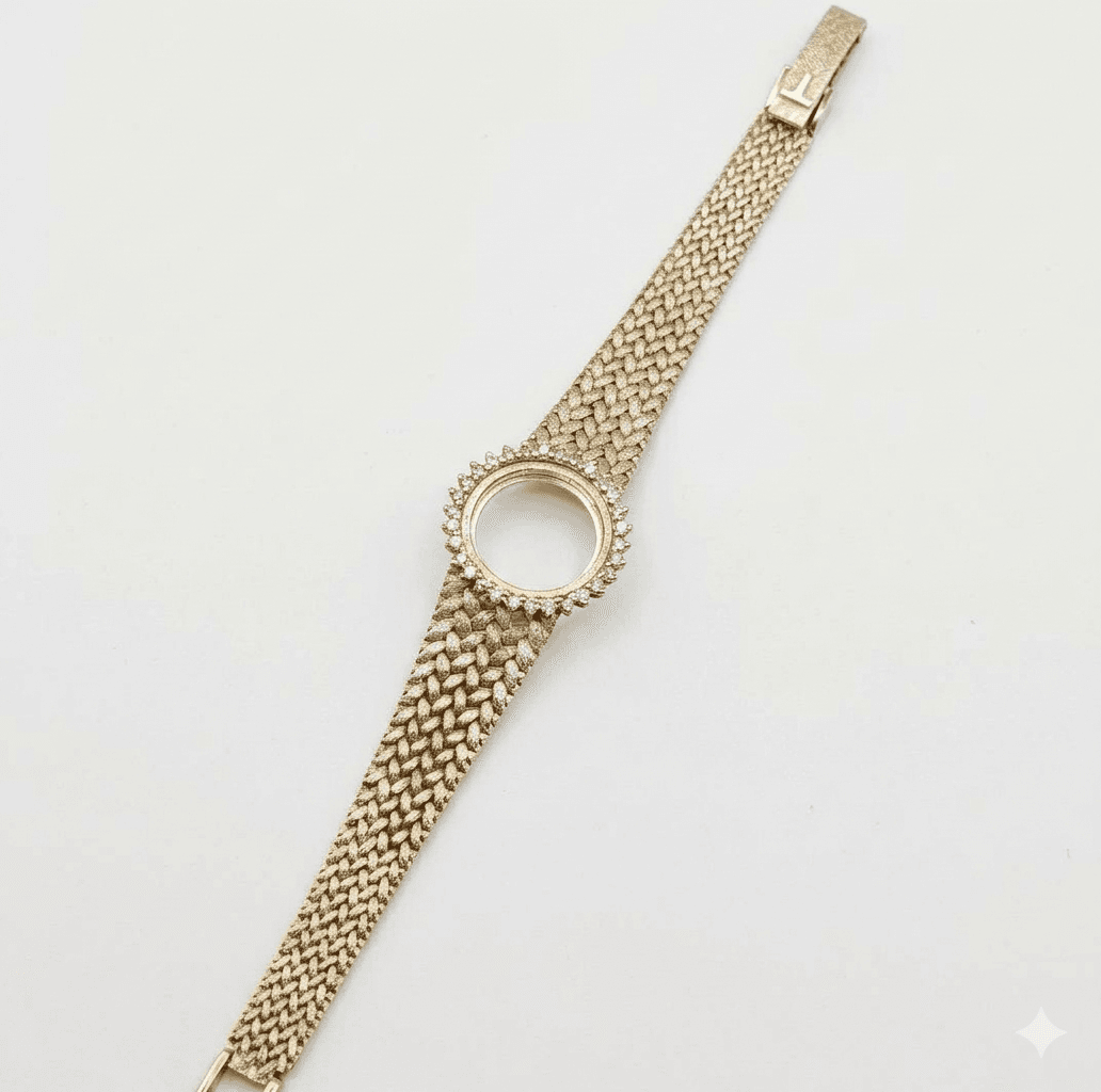 PARTIE DE MONTRE-BRACELET EN OR GRIS 750‰ COMPRENANT LA LUNE