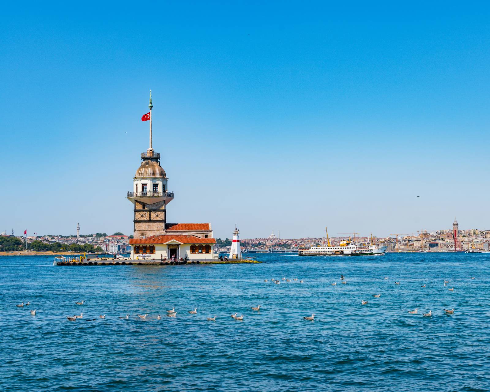 Beautiful coastal city with a historic lighthouse and sea view
