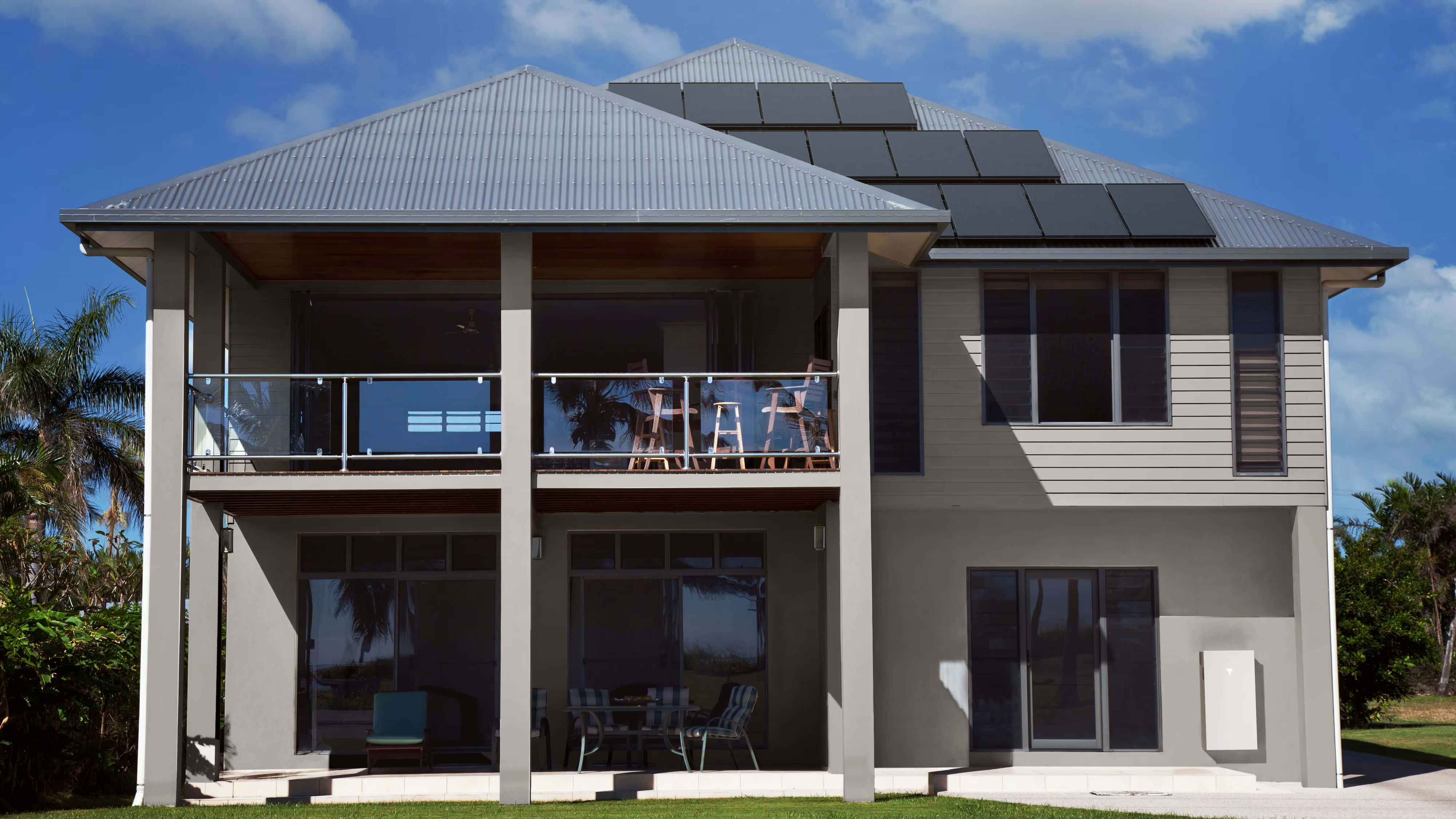 A modern home with Solar Panels and Powerwall