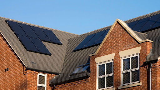 home roof with solar panels installed on top