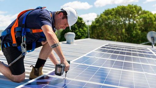 solar panel roofer installing panels