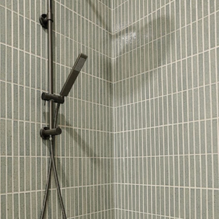 Kazoku Hatsu Border Hand Glazed Japanese Mosaic Tile installed