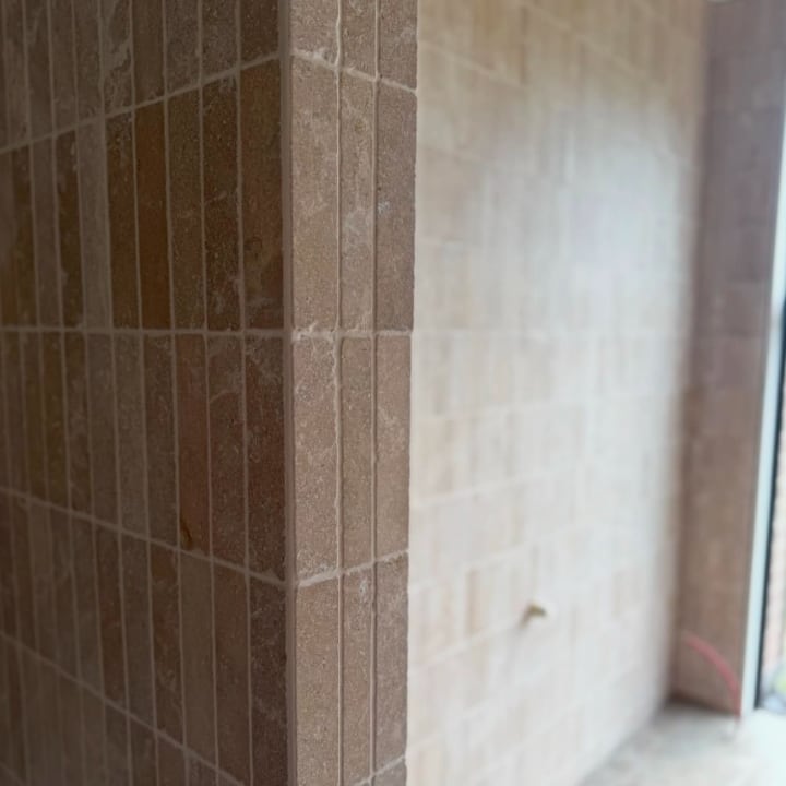 Stone Fingers Tumbled Subway Tile 50x200mm installed