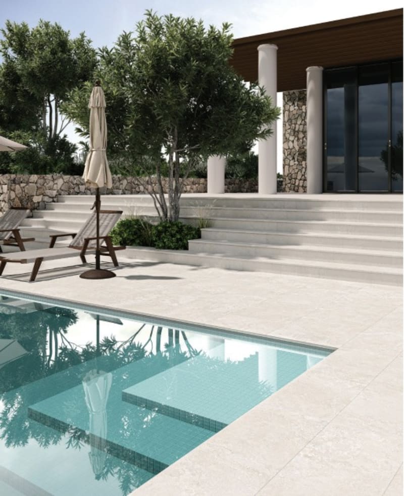 Tufa X-Cut 600x600x20mm porcelain paver in a crosscut travertine look on an Australian alfresco.