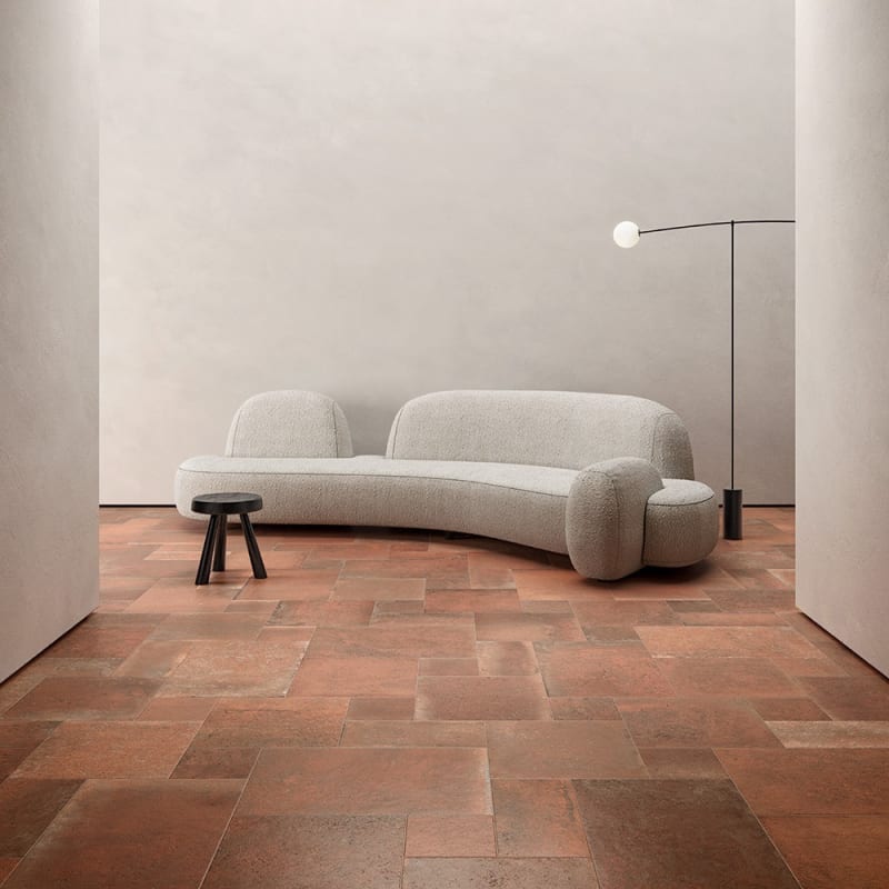Terra French pattern Italian porcelain in a warm Bruciata tone, showing the four-size modular layout.