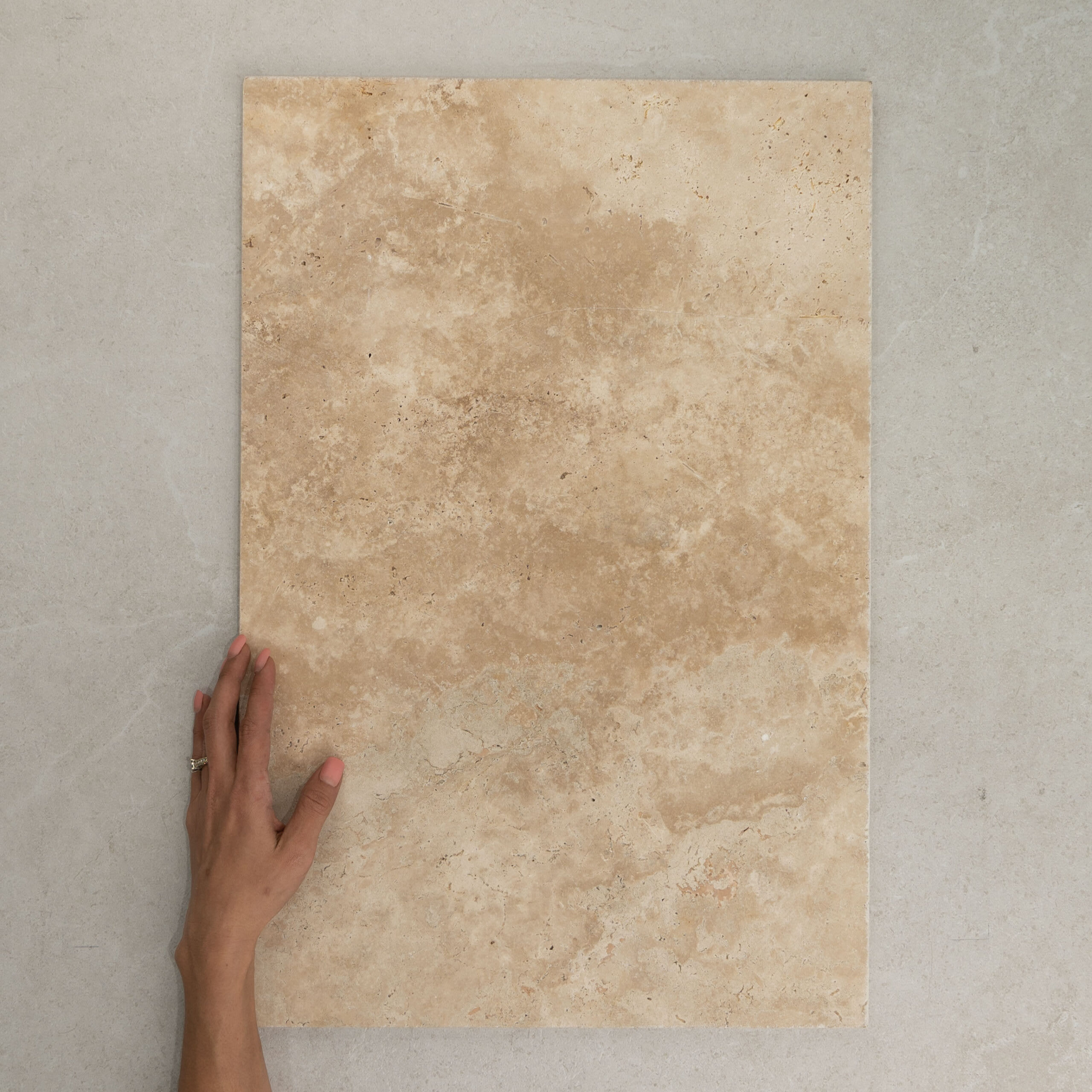 Classic tumbled natural travertine, genuine Turkish stone with soft pitting and warm ivory tones.