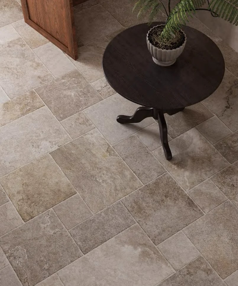 Concord French pattern stone-look porcelain in an earthy tone, a modular Versailles layout for floors and alfresco.