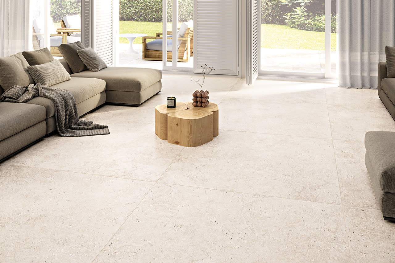 Tivoli travertine-look Italian porcelain in a cross-cut white tone, a low-maintenance alternative to natural travertine.