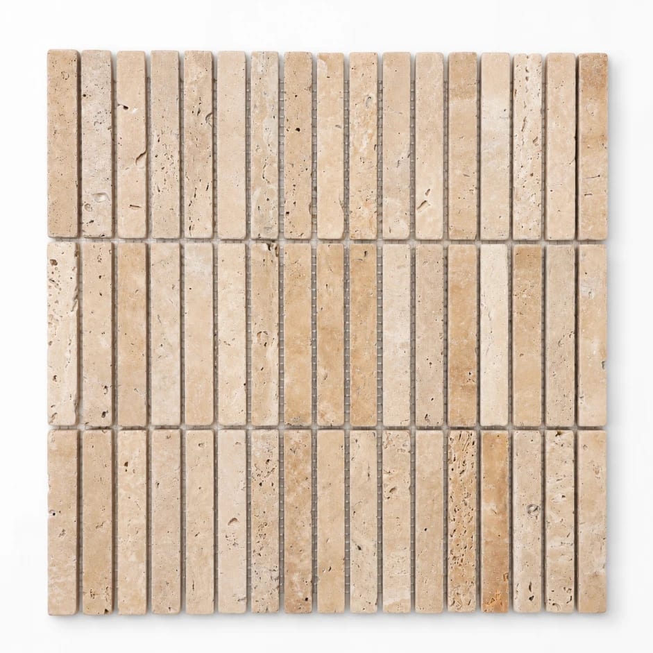 Stack Rome tumbled natural travertine mosaic, a stacked brick mosaic of warm ivory stone chips on a sheet.