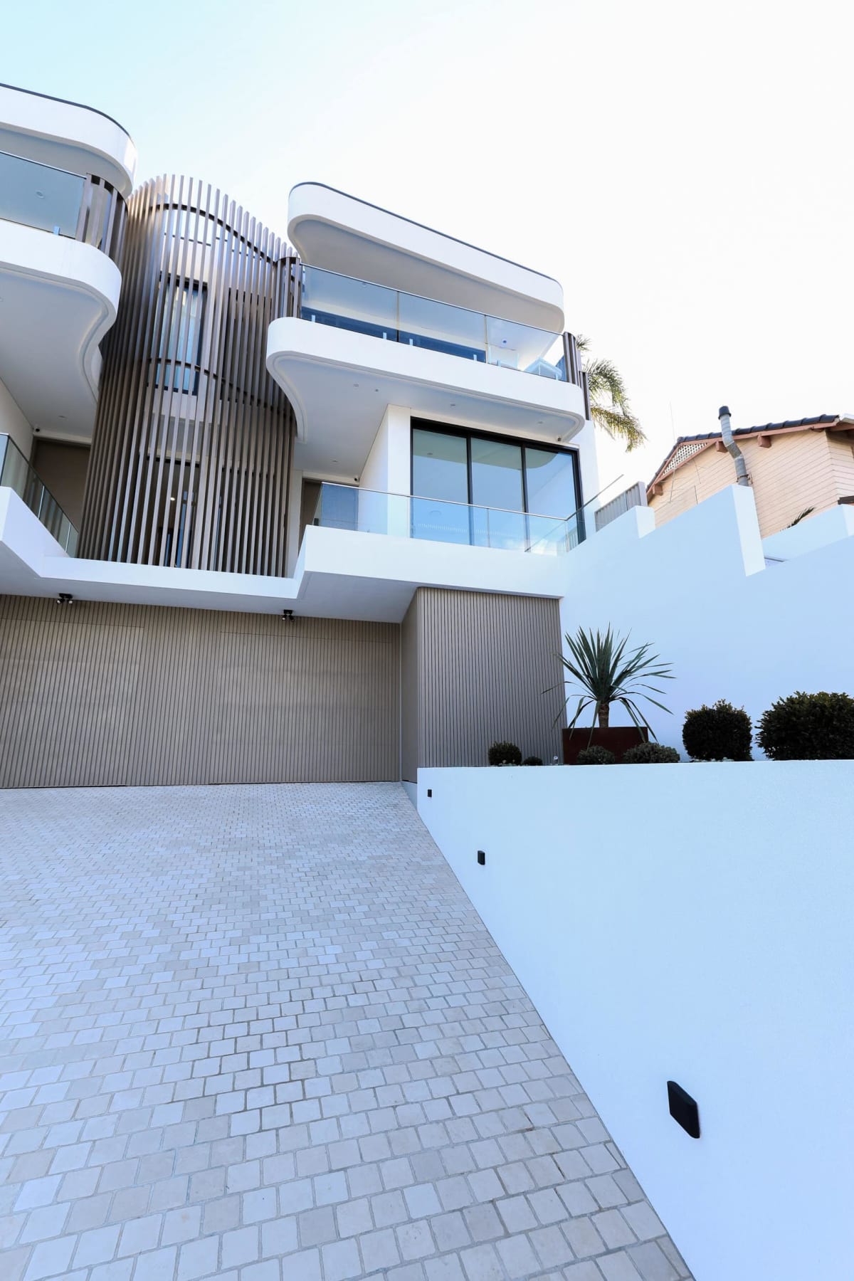 Modern Luxury Duplex in Sylvania – Limestone Look & Travertine Tiles Create Cohesion – project photograph