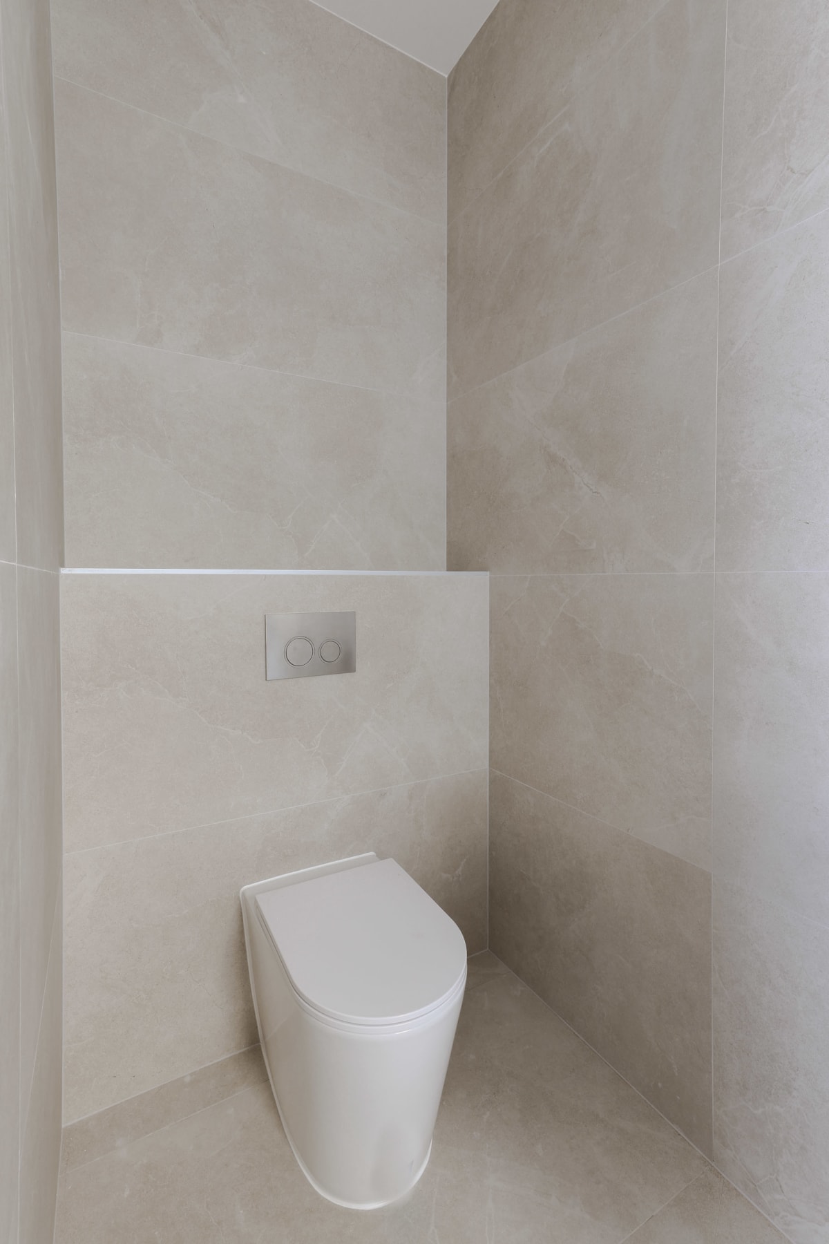 Modern Luxury Duplex in Sylvania – Limestone Look & Travertine Tiles Create Cohesion – Downstairs Main Bedroom Bathroom – Hotel-Inspired Retreat