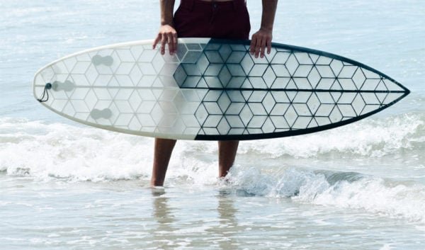 WYVE 3D-printed surfboard showing the distinctive hexagonal lattice structure