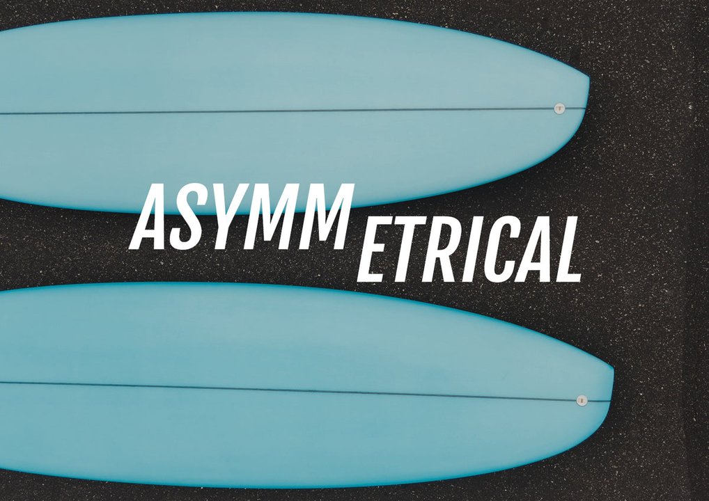 Two asymmetrical surfboards side by side showing the contrasting rail and tail designs
