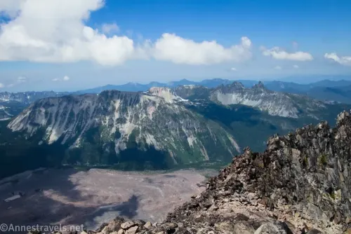 Clouds over mountains and the toe of the Winthrop Glacier from Third Burroughs Mountain in Mount Rainier National Park 