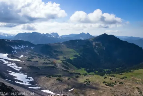 Clouds over mountains and meadows along the Burroughs Mountain Trail in Mount Rainier National Park, Washington 