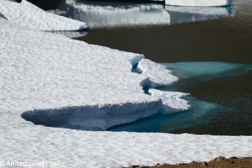 Snow and ice in Frozen Lake along the Sourdough Ridge Trail in Mount Rainier National Park 