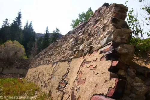 An old dam made of rocks and concrete beside Lake Blanche 