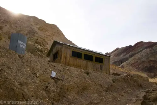 Looking up at an old wooden building in the mine area of Corkscrew Canyon, Death Valley National Park, California