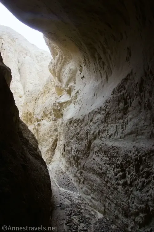 A dark and narrow section of the slot canyon in Corkscrew Canyon, Death Valley National Park, California