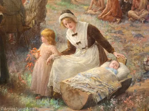 Closeup of a mother Pilgrim and her two children from a painting in Pilgrim Hall, Plymouth, Massachusetts
