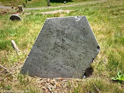 A tilted gravestone on Burial Hill, Plymouth, Massachusetts